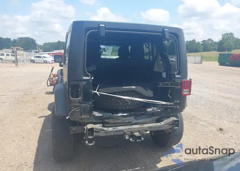 2014 Jeep Wrangler Unlimited Sport z USA, uszkodzony, nr VIN 1C4BJWDG8EL185971